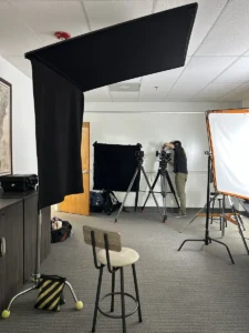 A negative fill being used by Kim Brattain Media at a shoot.